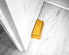 Gold bullion - door stopper 