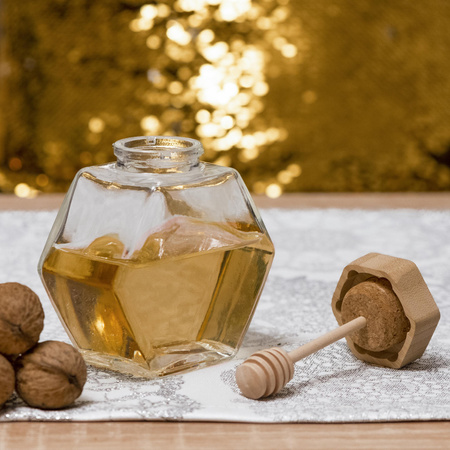 Hexagon honey jar with wooden dipper
