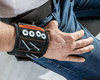 Magnetic wrist band with pockets